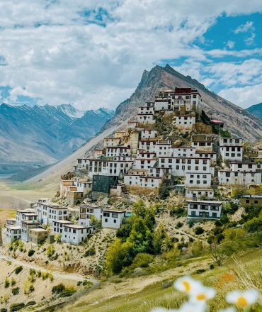 Scenic view of Key Monastery perched on a hill in the Himalayas, surrounded by stunning nature.